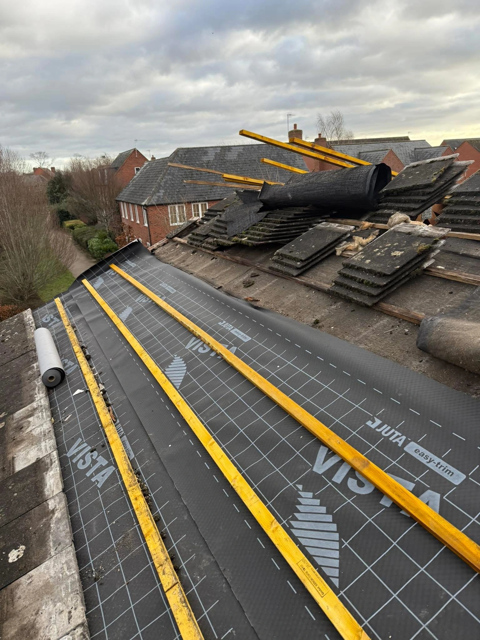Finished fascia, soffit and guttering on a brick home